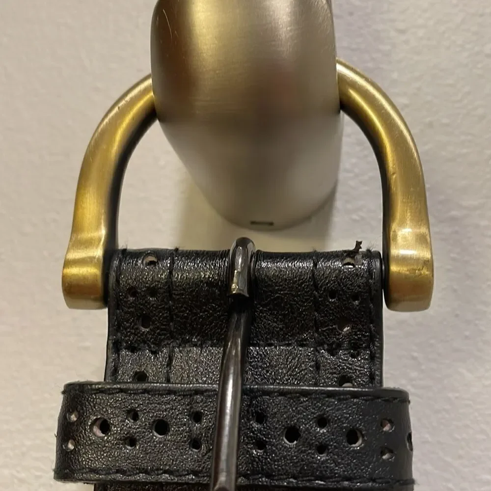 Woman’s black leather belt